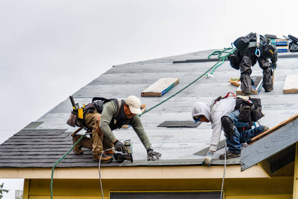 Professional Gutter Installation technician working in Westminster, MA